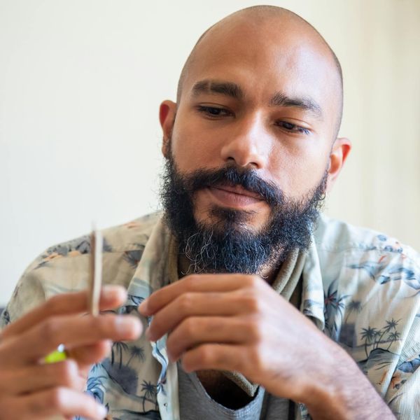 Close-up of a person's hands in a mindful gesture, symbolizing awareness and attention.
